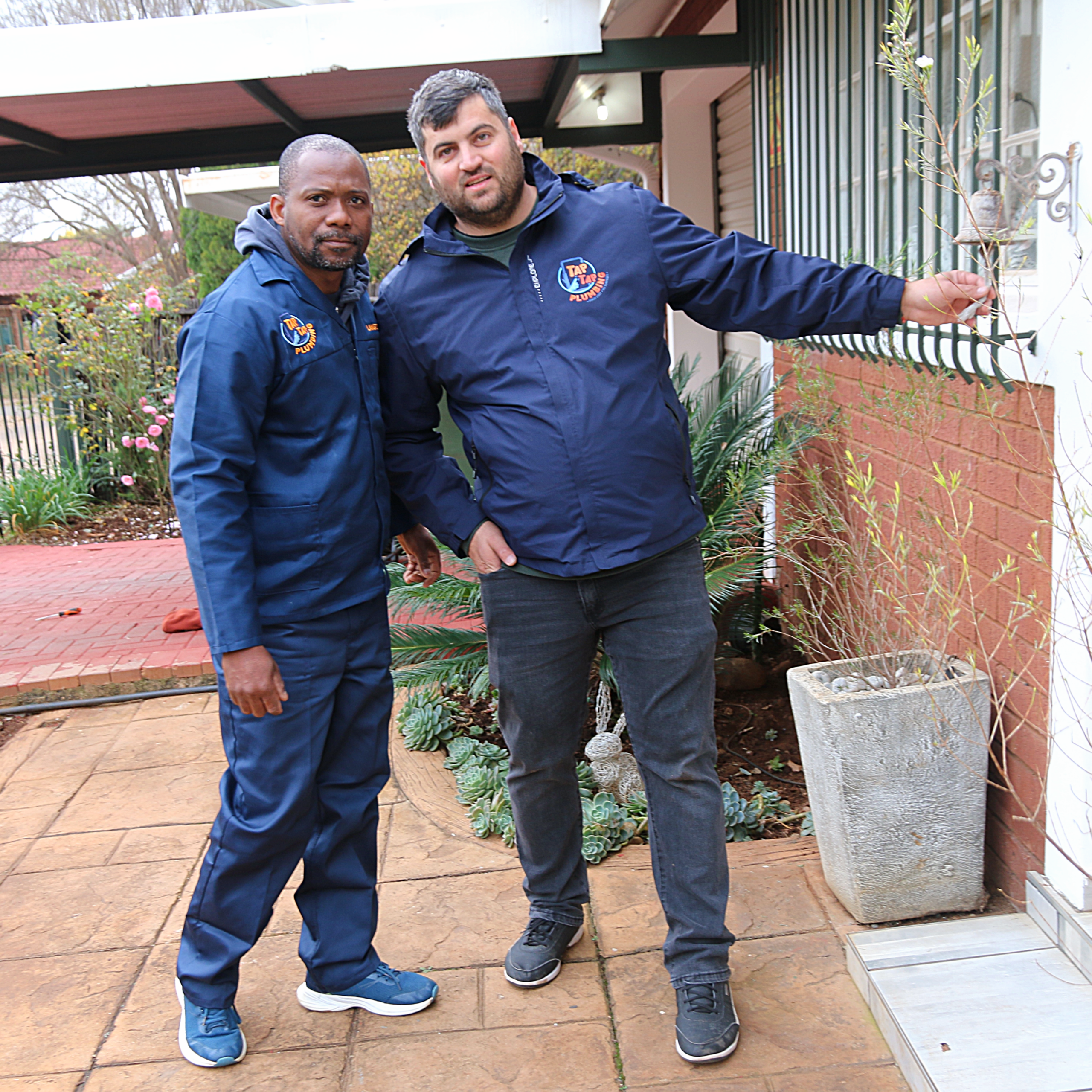 Tap Tap Plumbing founder and team member assisting homeowners at a residential property in Potchefstroom